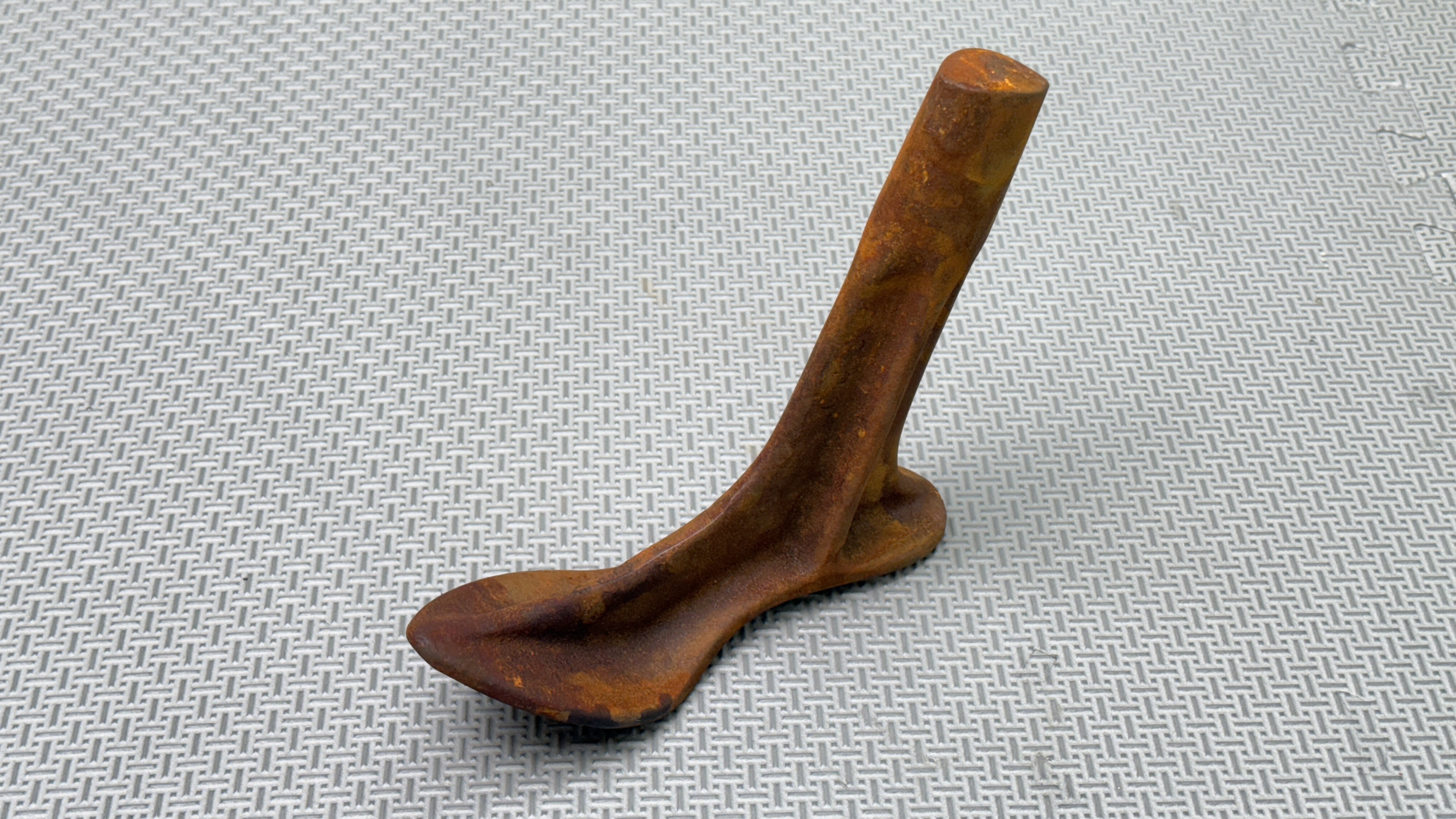 Cast-iron shoe forms photograph